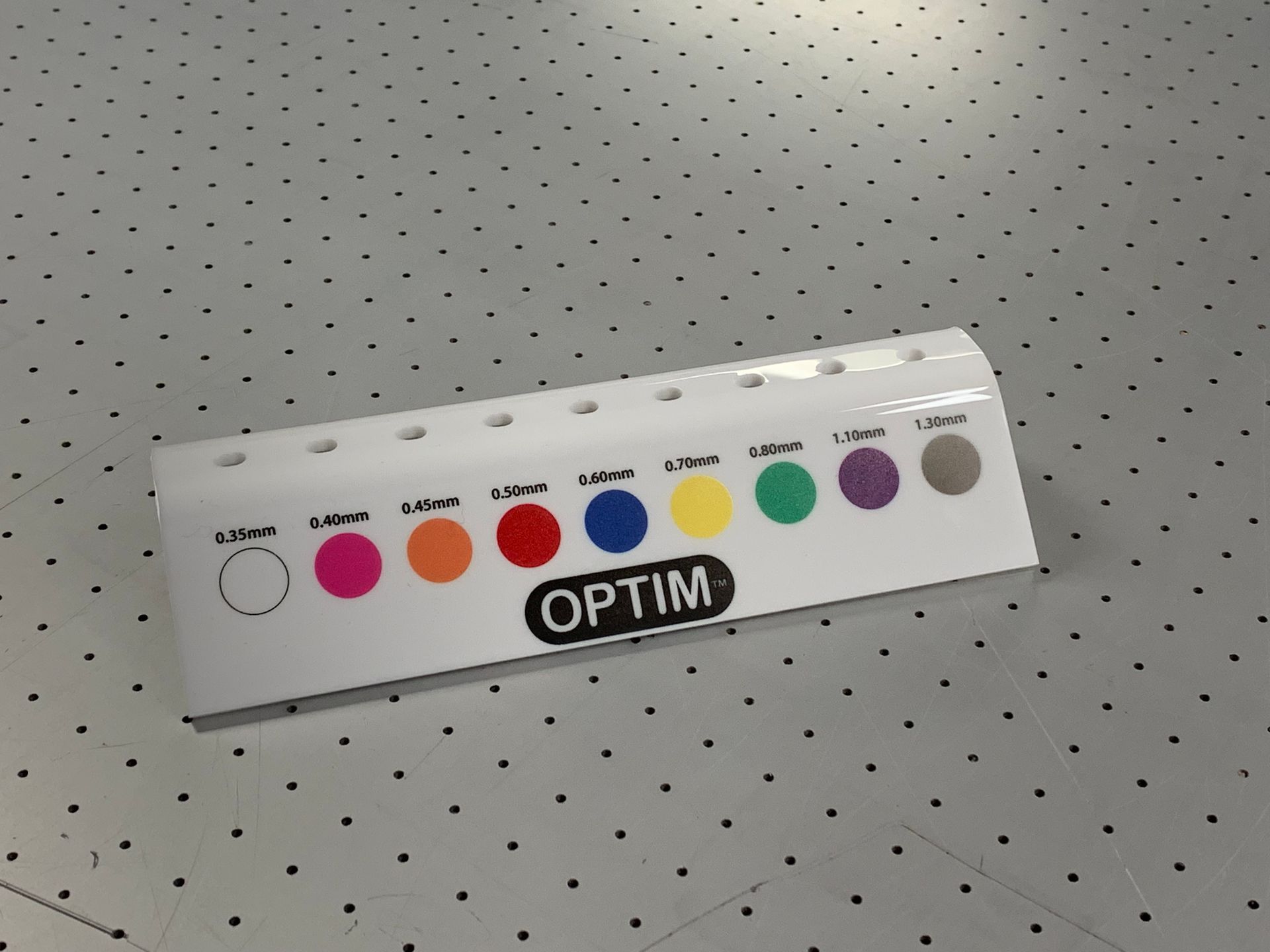 Heat formed Acrylic Optim Interdental Brushes diameter gauge