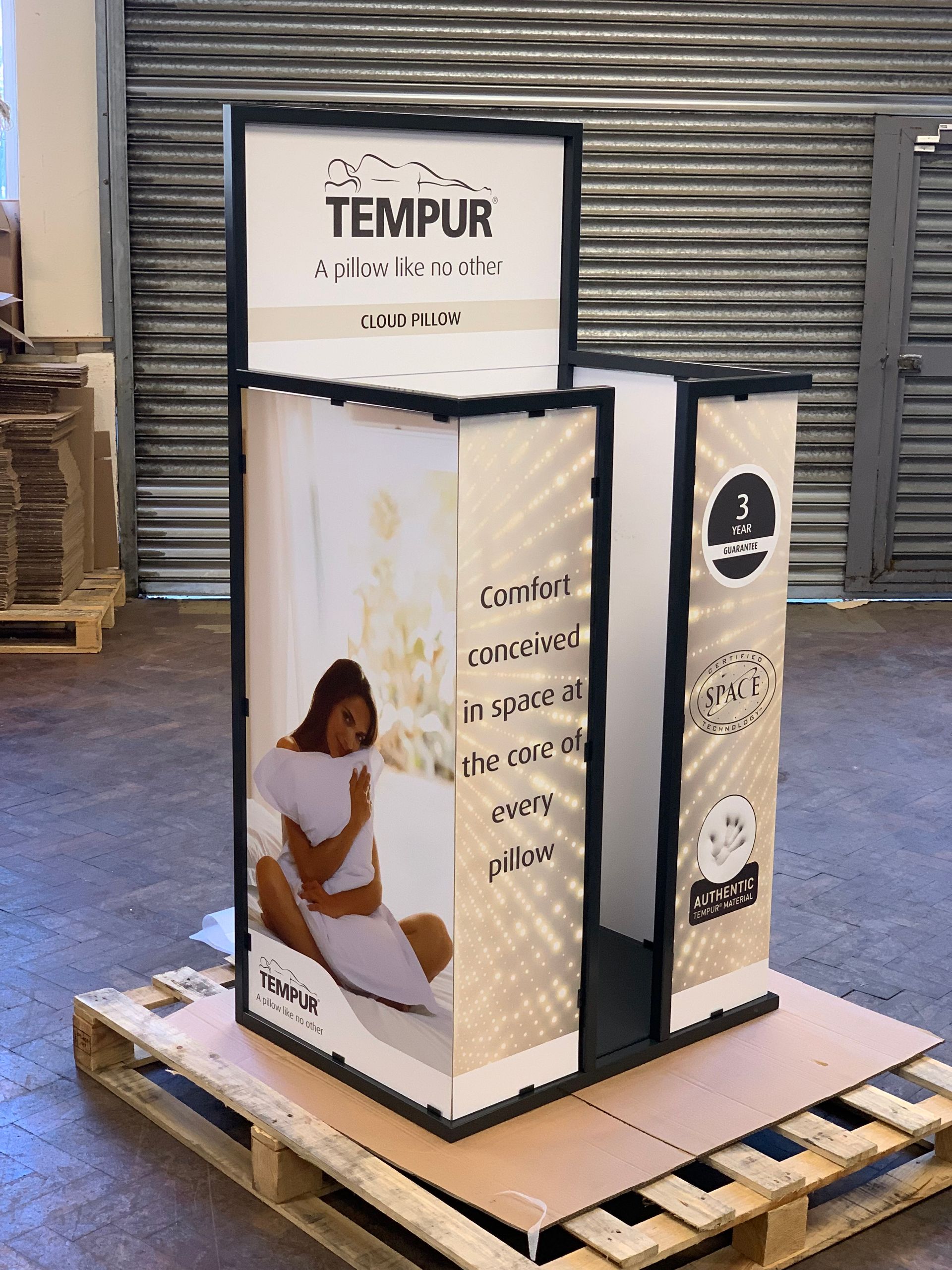 Metal frame point of sale unit with printed panels for Tempur pillows