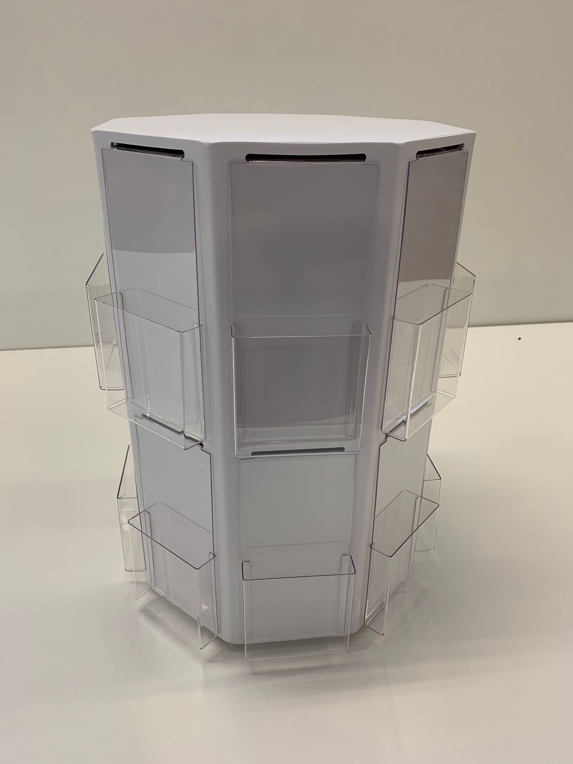 Clear acrylic fabrication, heat forming & assembly creating rotating point of sale sticker dispenser