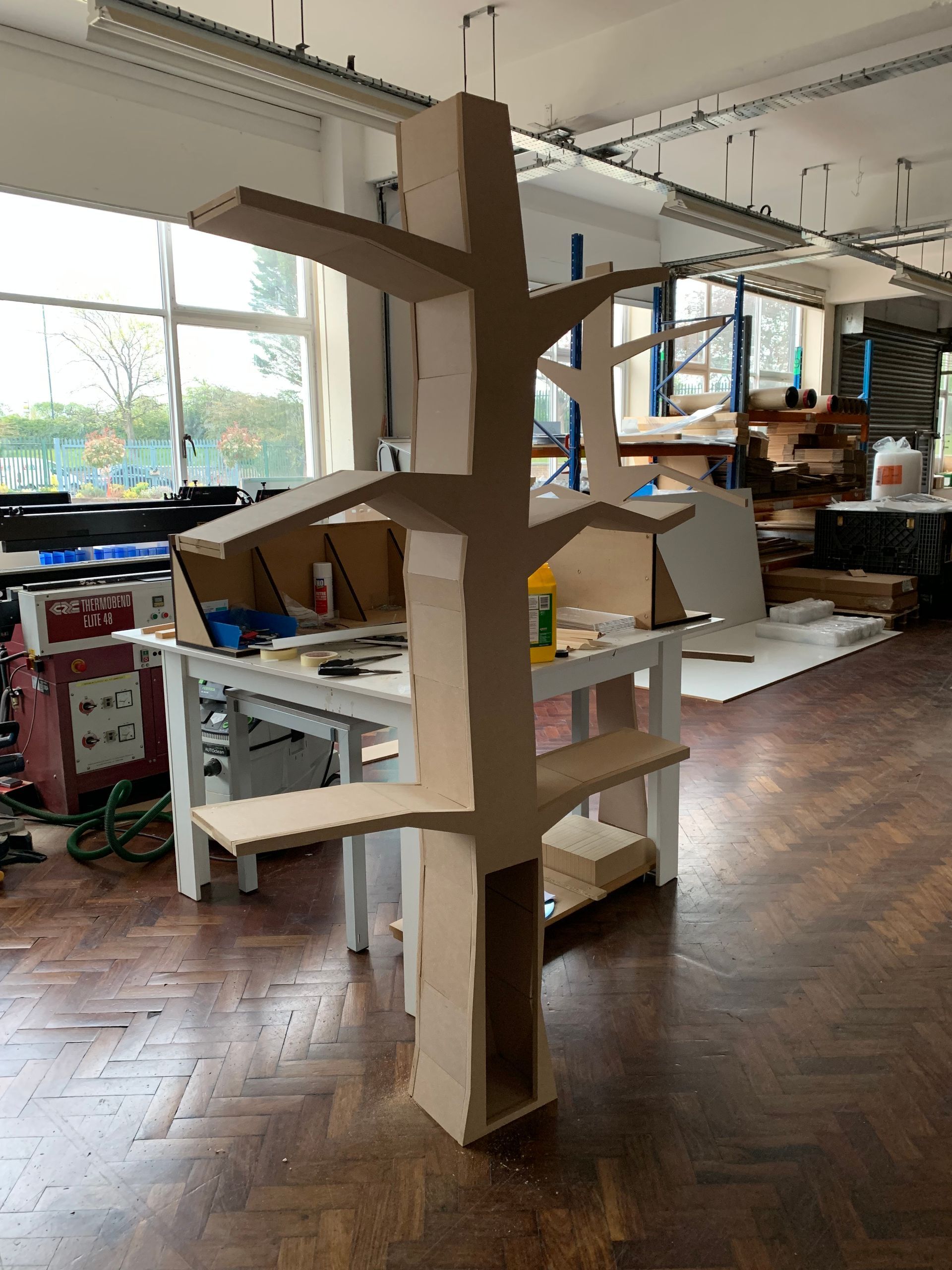 Bespoke painted tree construction made from laser cut MDF assembly