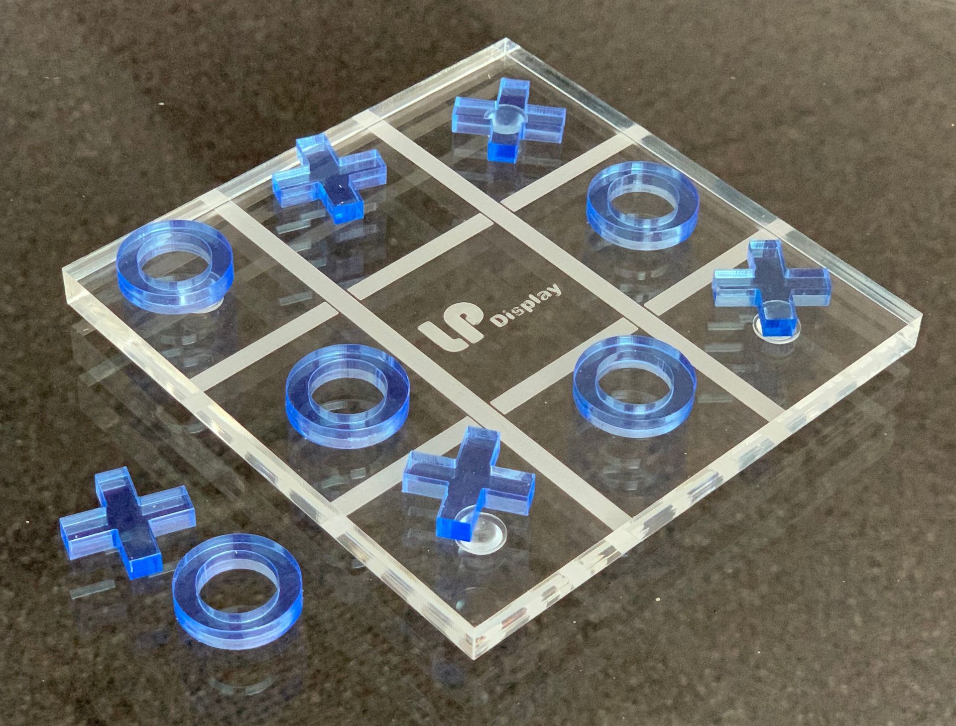 noughts and crossed board manufactured in clear perspex