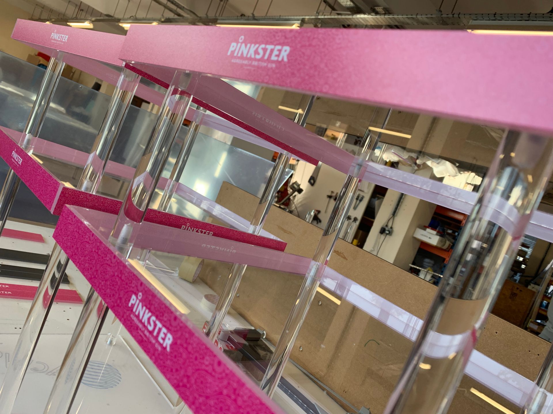 Manufactured Clear perspex shelving with printed Pinkster logo