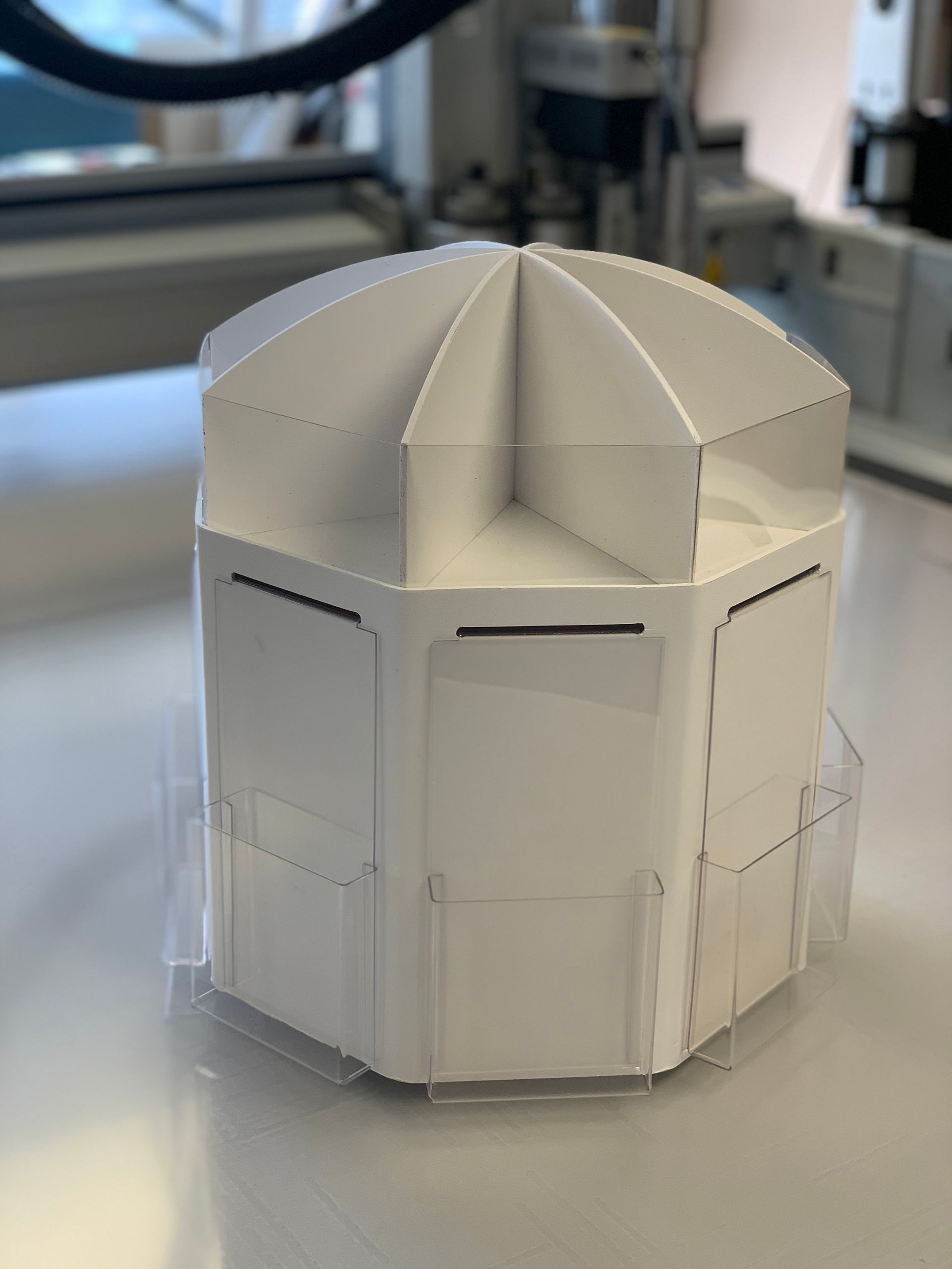 Rotating octagon shaped leaflet dispenser manufactured in foamex with clear acrylic fabrication, heat forming pockets