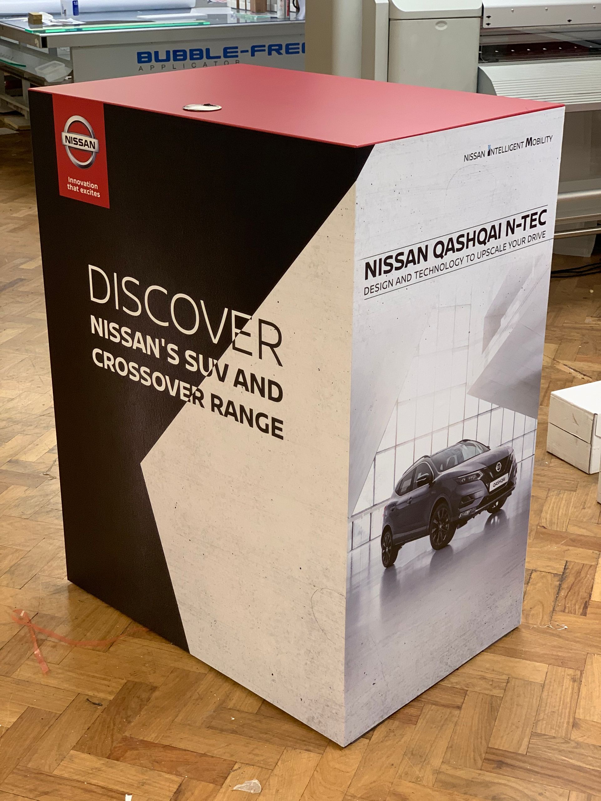 Promotional counter with locking cupboard for Nissan