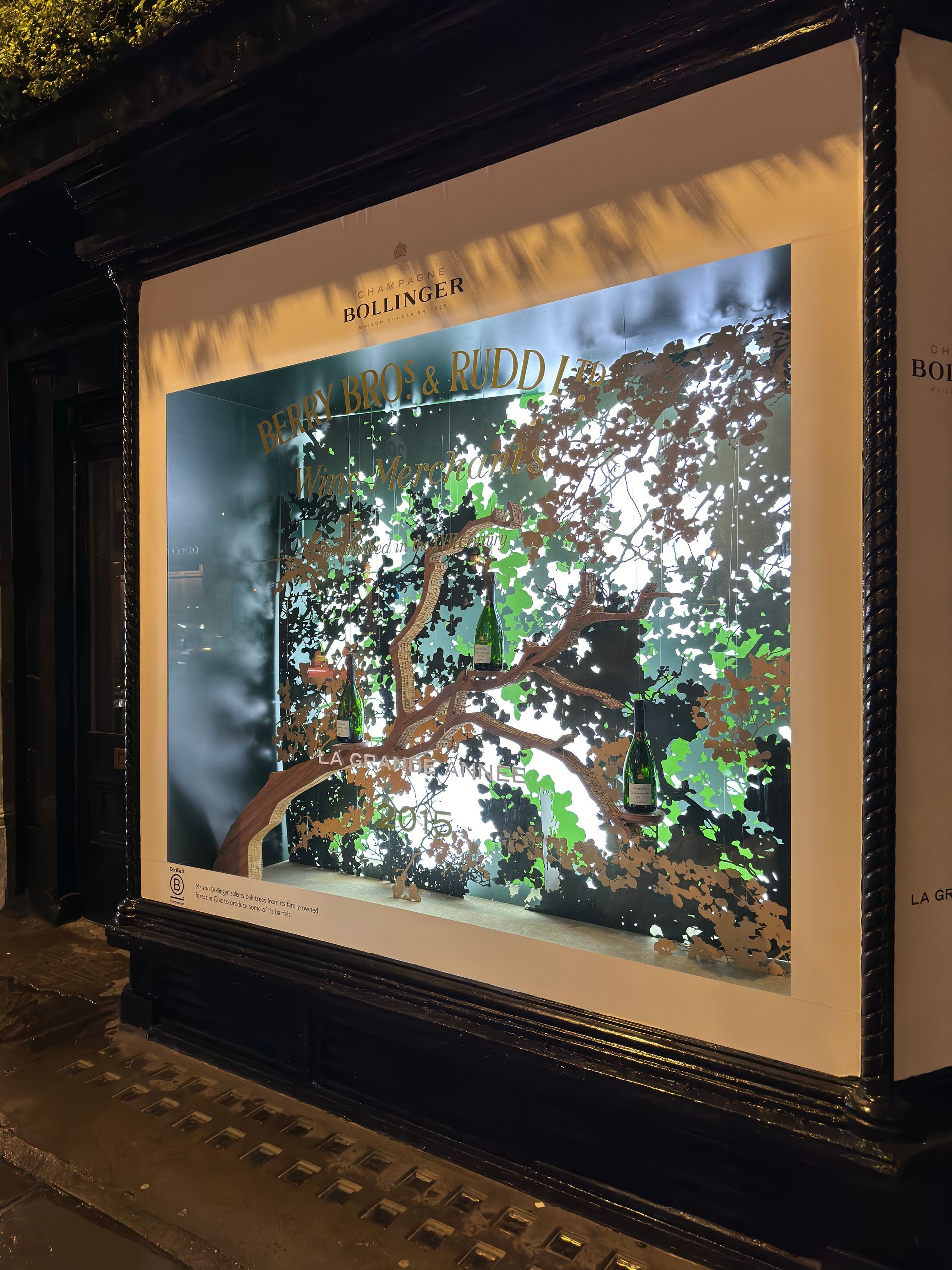 Bollinger window display featuring CNC cut corrugated board tree