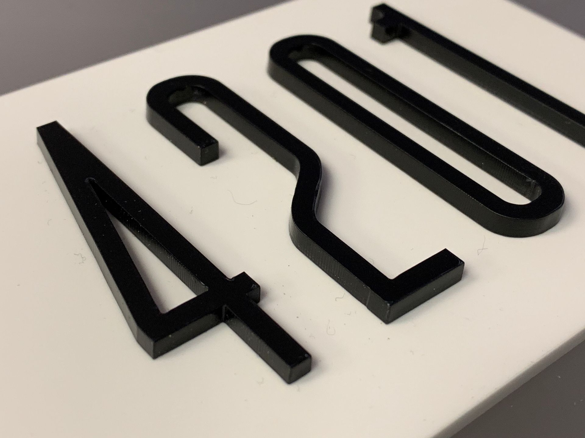 Black acrylic CNC cut 3d numbers