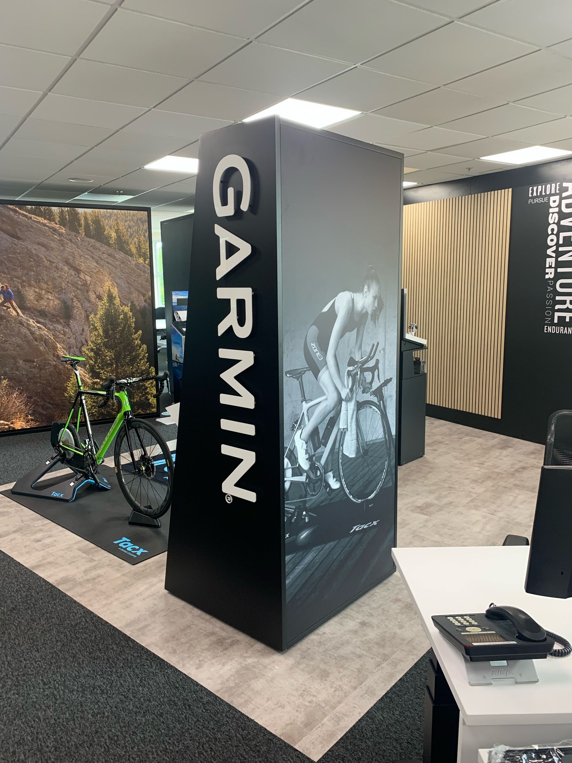 Garmin totem brand display with printed panel graphics