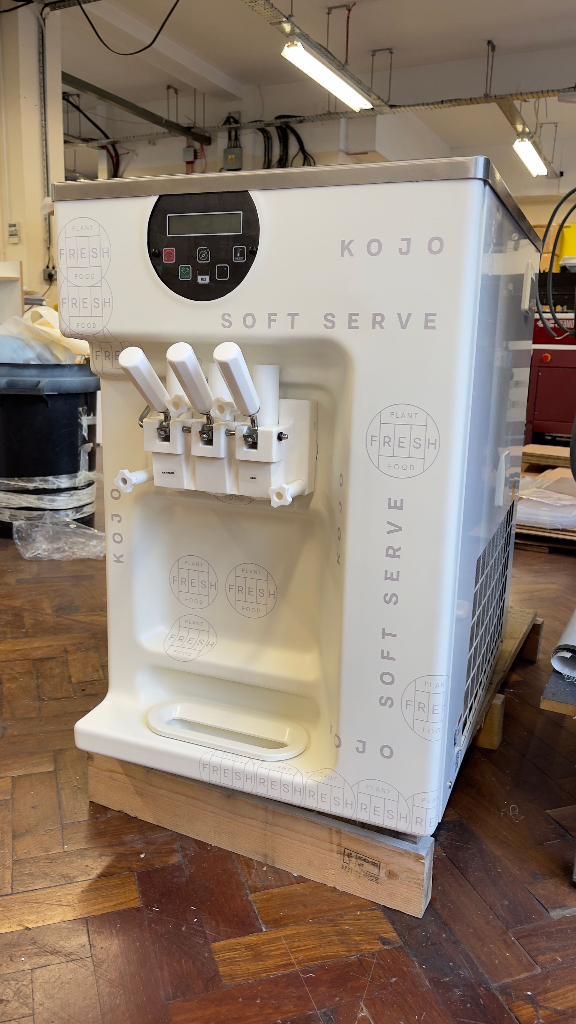 Self adhesive vinyl lettering and logos applied to Kojo dispenser