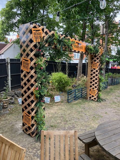 Manufactured and installed Orchard Thieves branded pagoda arch side view