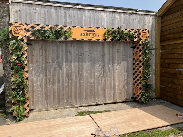 Manufactured and installed Orchard Thieves branded pagoda arch front view