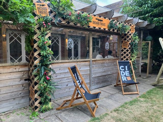 Orchard thieves Printed deck chairs and printed brand panels close up