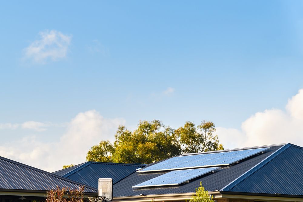 Blue Solar Panels on A Dark Blue Roof — SOLARCO Central West in Orange, NSW