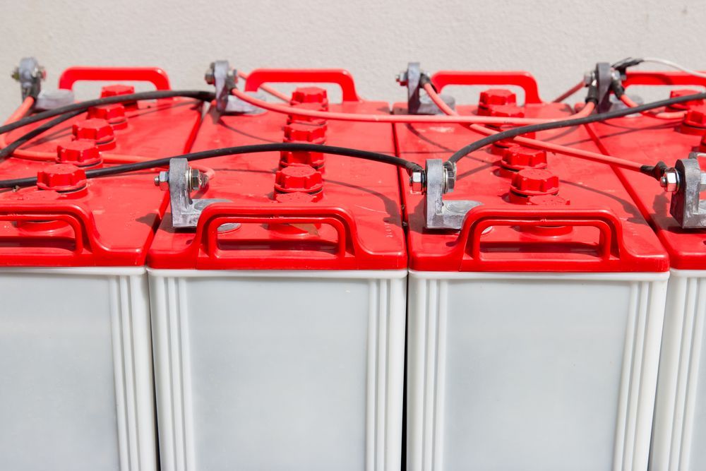 Red Battery Terminals Connected in a Row — SOLARCO Central West in Orange, NSW