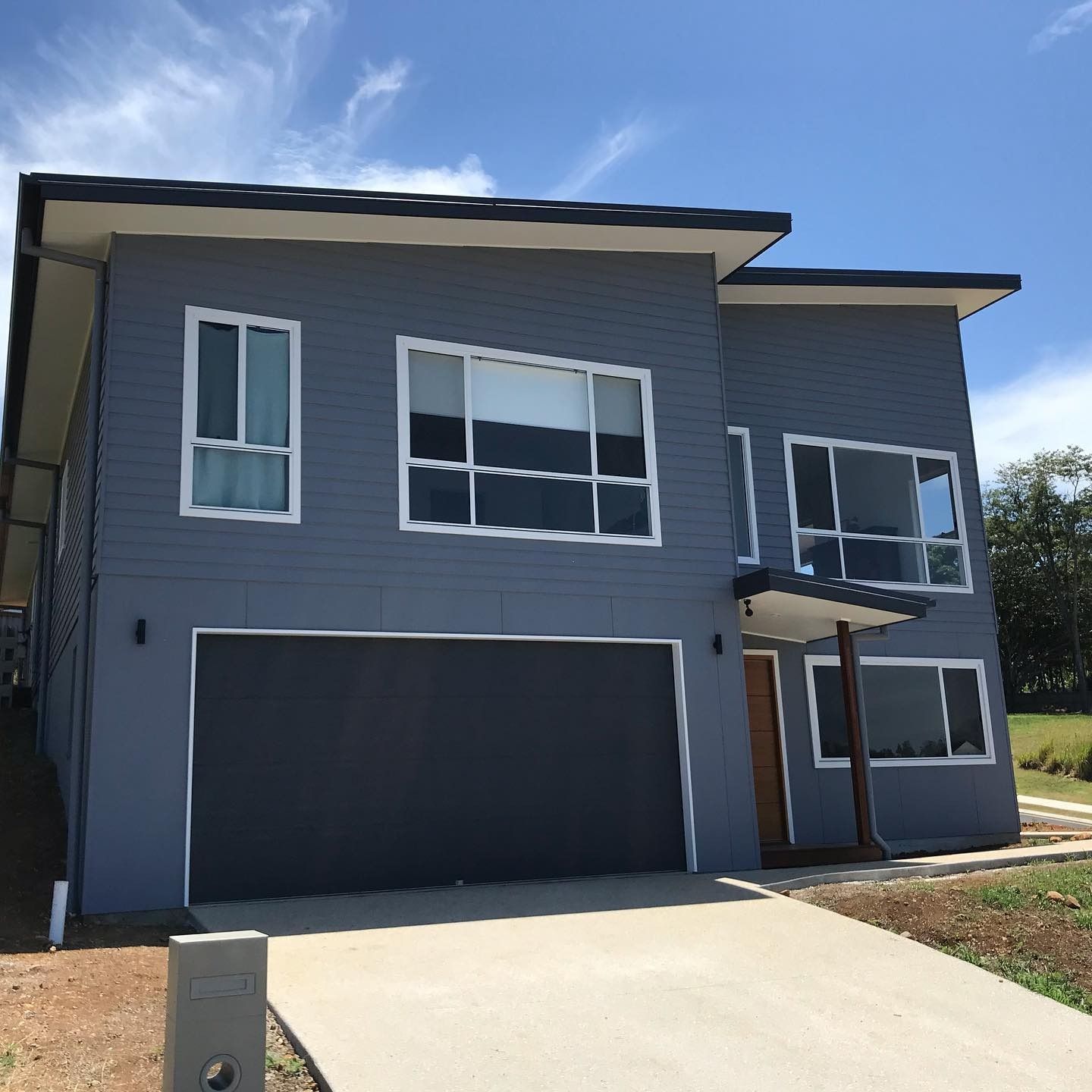 Modern Two-story House With Slanted Roof
