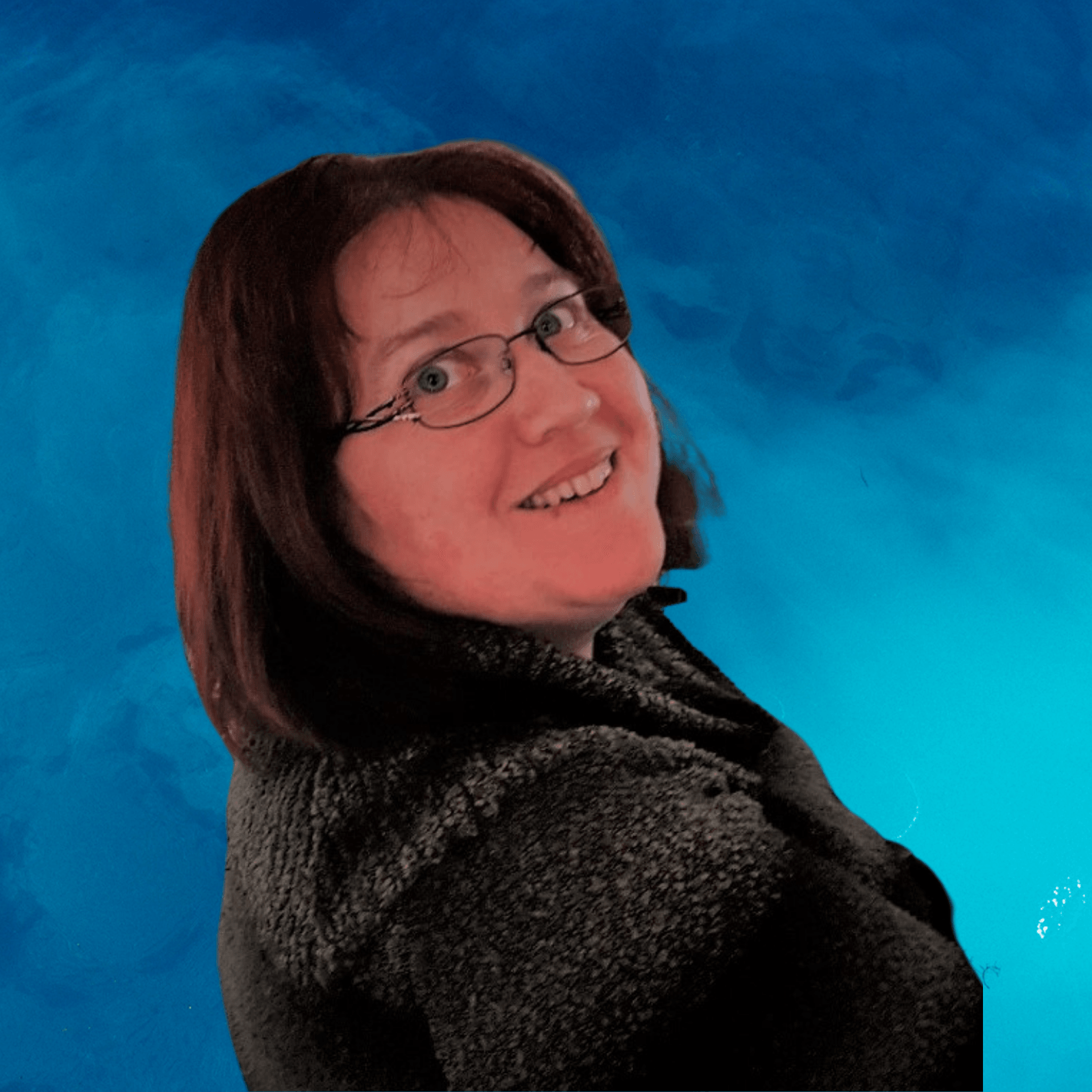 A woman wearing glasses is smiling in front of a blue background