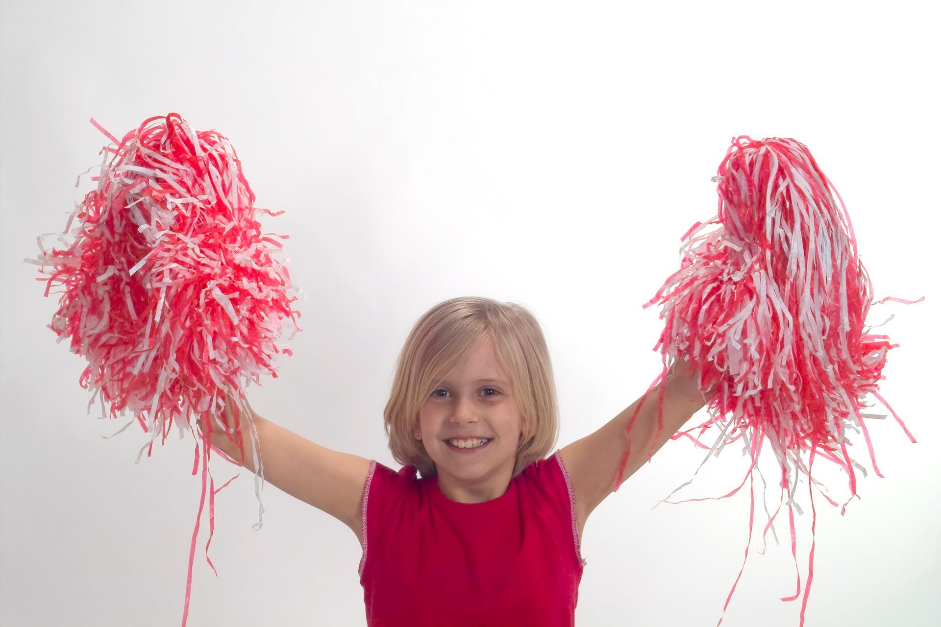 A Boy Raising His Two Hands With A Poms Poms — Wichita, KS — Young World Dance Studio A Boy Raising His Two Hands With A Poms Poms — Wichita, KS — Young World Dance Studio
