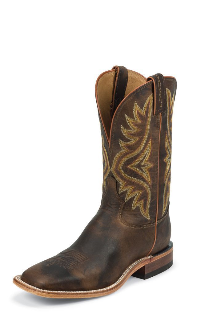 A pair of brown cowboy boots on a white background.