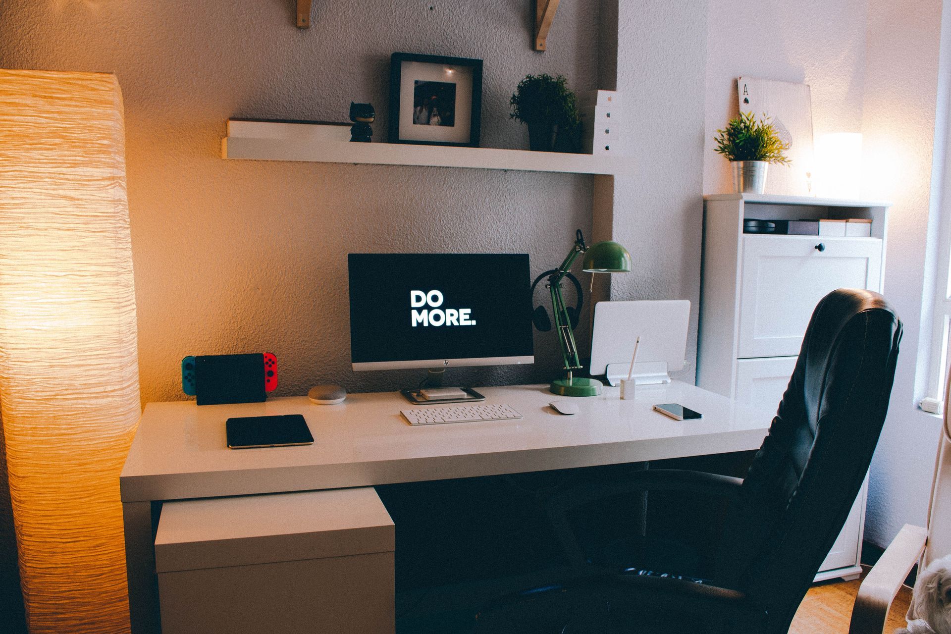 Tidy desk workspace with Do More sign for student productivity tips