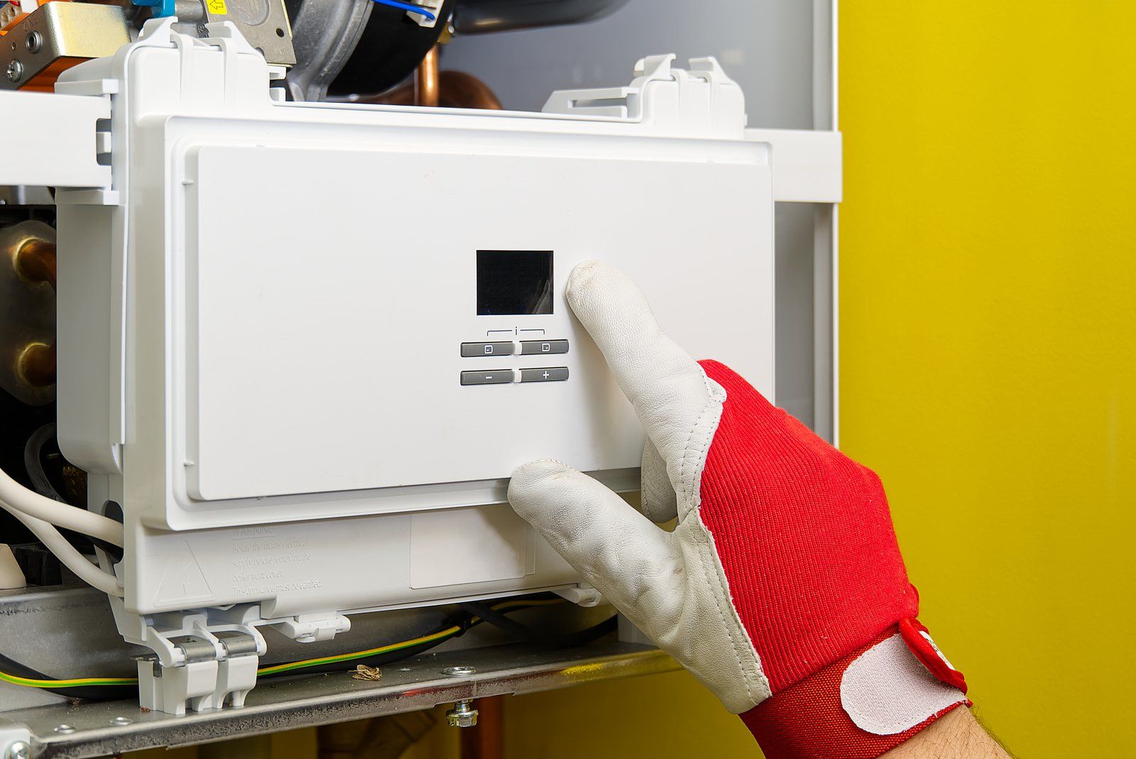 worker pointing the machine