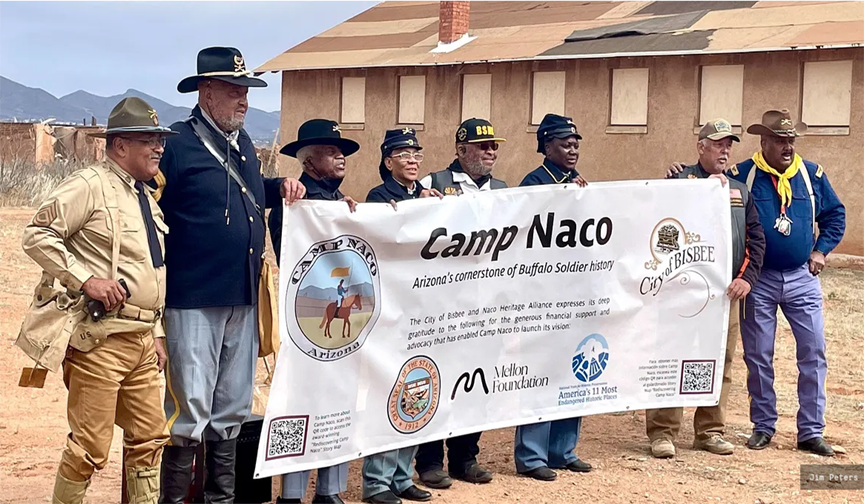 Group holds banner 