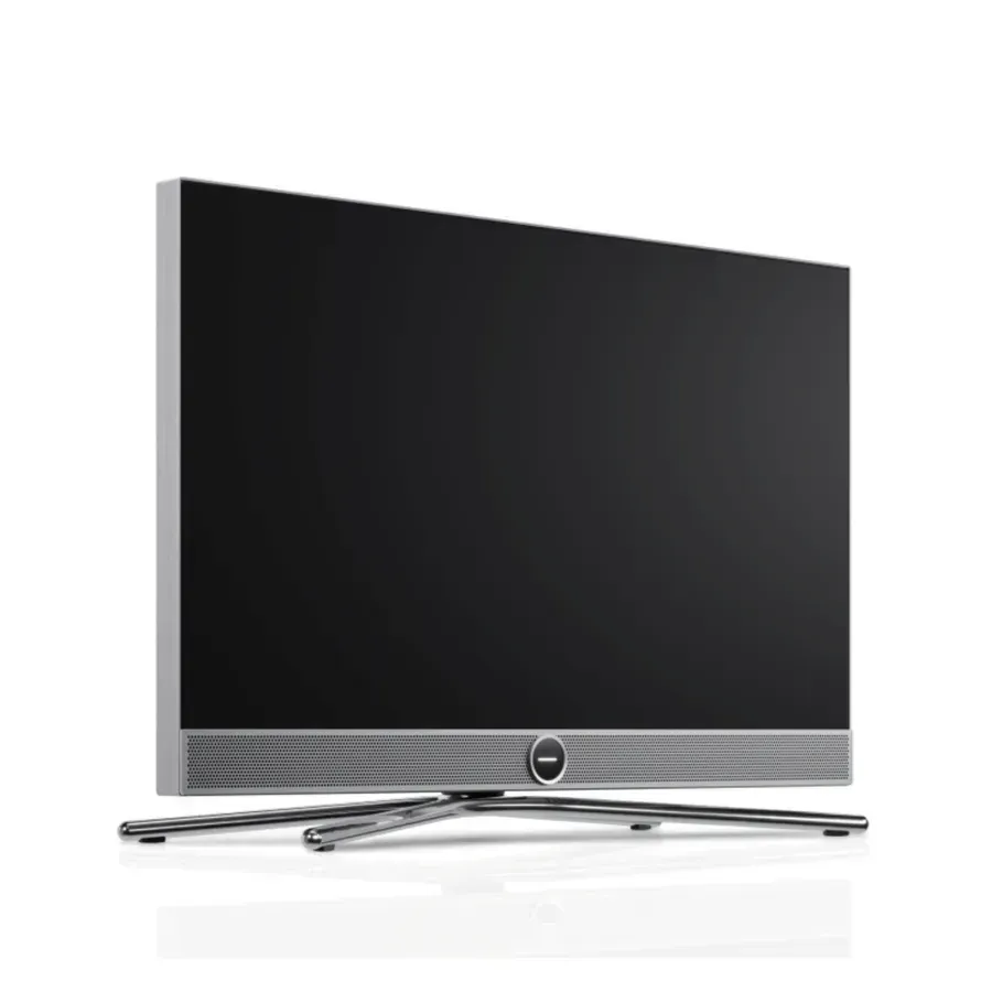 Loewe Vega DLED Flachbildfernseher mit sternenblauem Display und silbernem Standfuß, 32-Zoll-Etikett.