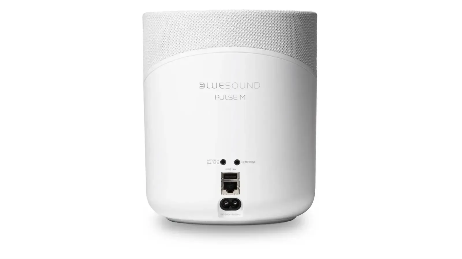 Weißer zylindrischer Smart Speaker mit Stoffoberfläche und minimalistischem Logo auf schlichtem Hintergrund