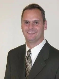 Dr. John P. Milham, B.S., D.C.