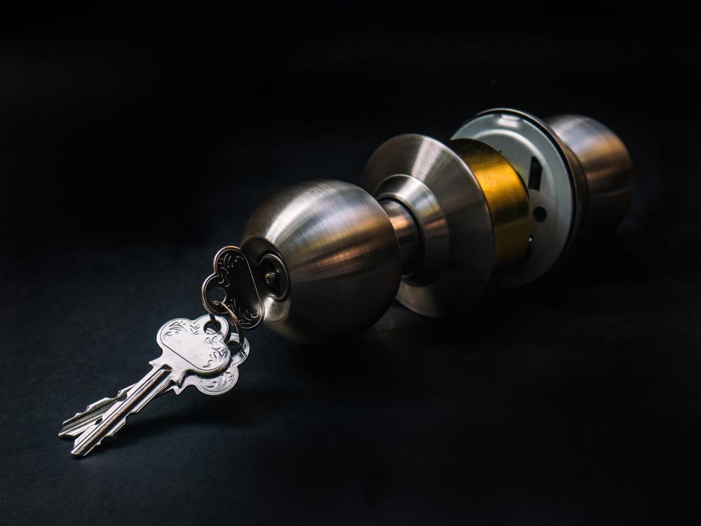 Door Lock With Keys Inserted — Locksmith In Bendigo, VIC Door Lock With Keys Inserted — Locksmith In Bendigo, VIC