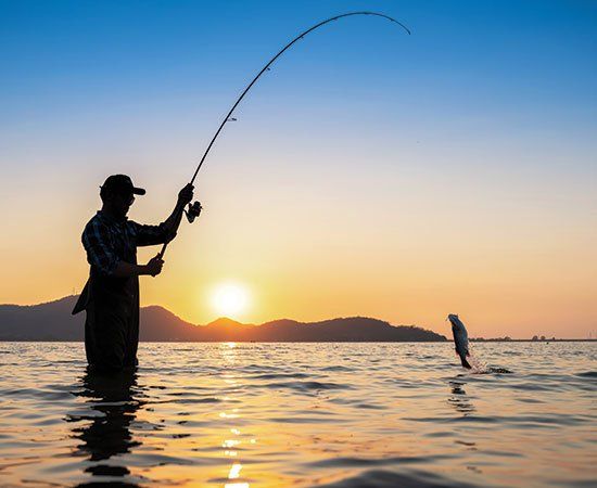 Man Fishing — Eau Claire, WI — Law Offices Of Jeffrey Klemp LLC