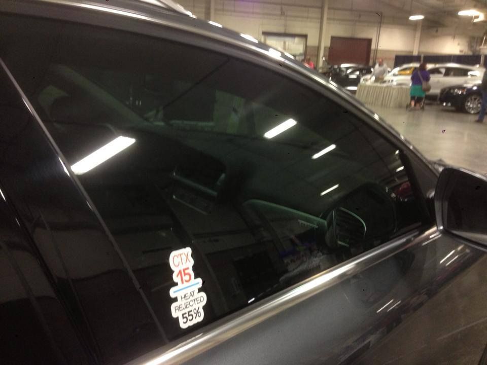 A car with a sticker on the window that says 15