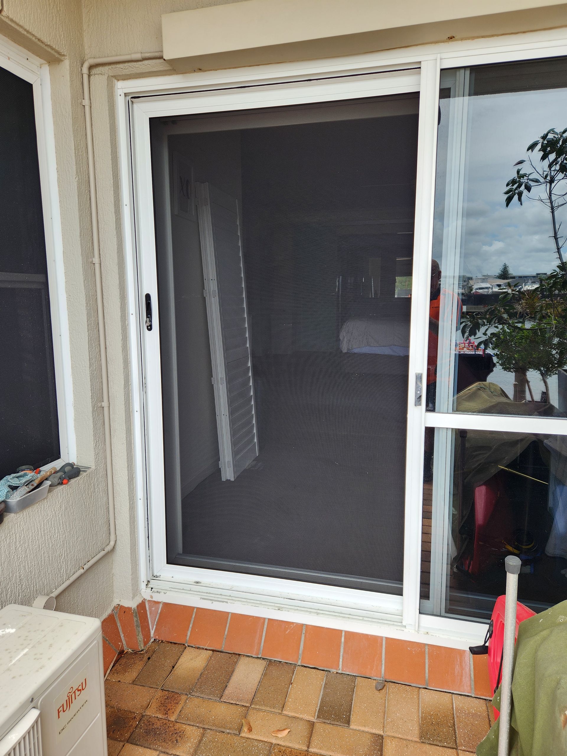 Screen Guard Extreme Black Framed Screen Door with Logo — Smart Screens Qld in Ormeau, QLD