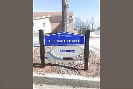Sign for C.L. Nall Chapel, blue and white with 