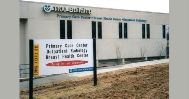 Exterior of medical building with sign for Primary Care, Outpatient Radiology, and Breast Health Center.