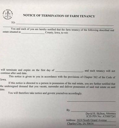 A notice of termination of farm tenancy is written on a piece of paper A notice of termination of farm tenancy is written on a piece of paper
