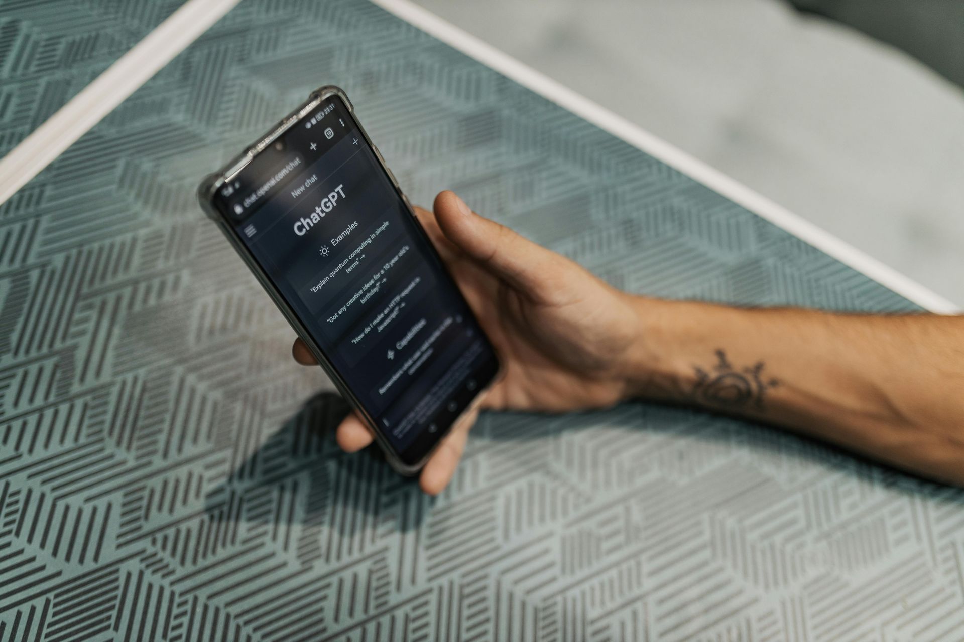 smartphone showing ChatGPT used for research and selection of local businesses 