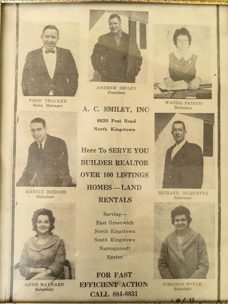 A black and white advertisement for a real estate company