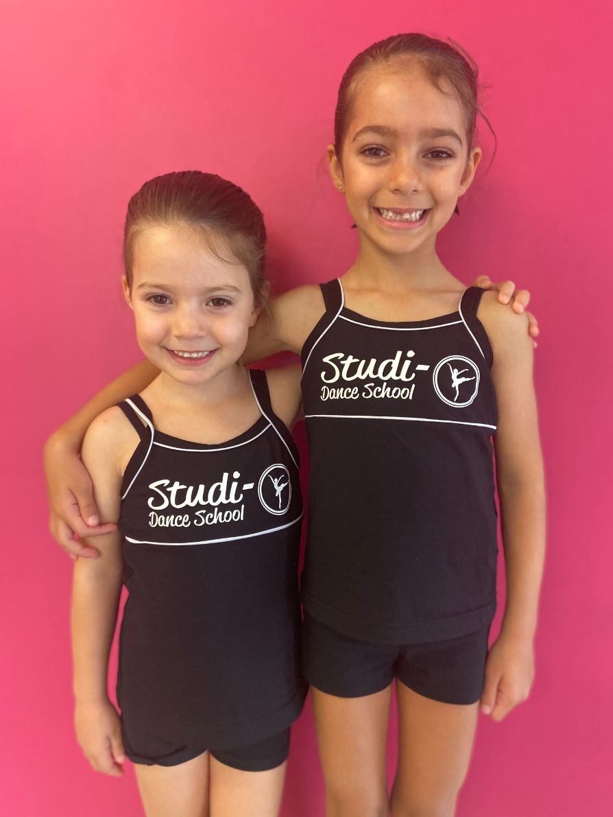 Two Young Girls Wearing Black Tank Tops With the Word Studi-O on Them — Studi-O Dance School In Gateshead, NSW