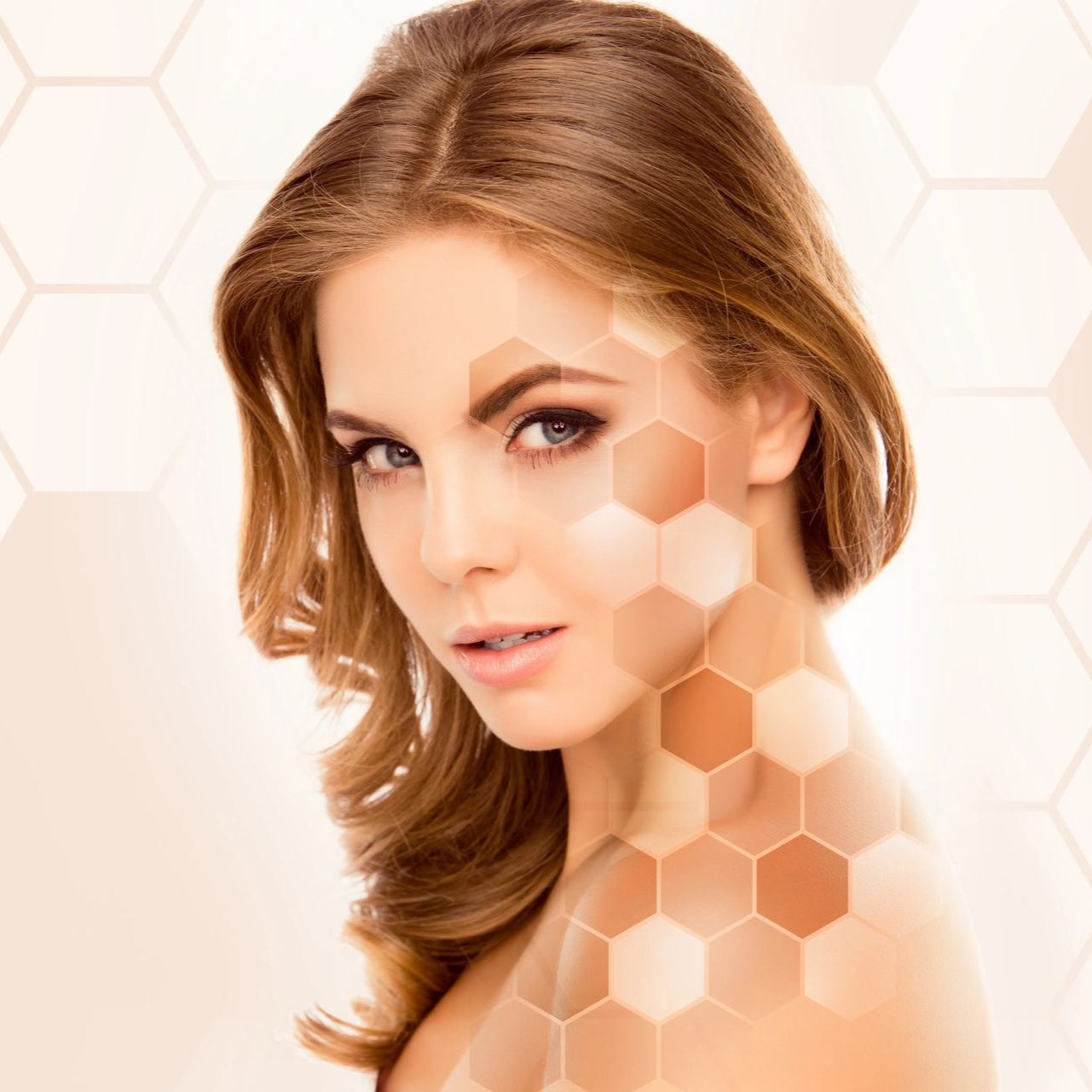 Portrait of a woman with auburn hair, looking at the camera against a white hexagon background