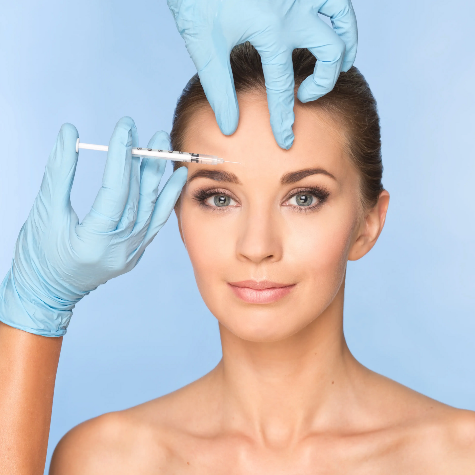Gloved hands apply a cosmetic injection near a woman’s eyebrow against a blue background