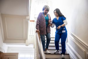 Medical Worker Helping his Patient — Fishers, IN — Alluring Warmth Home Care LLC