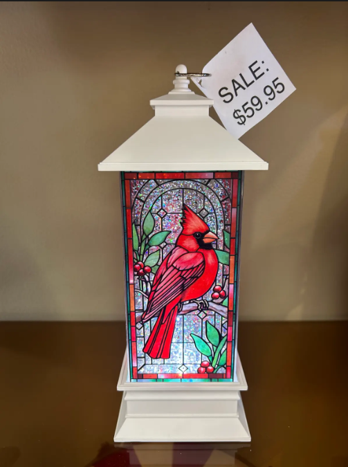 White lantern with stained-glass look, red cardinal illustration,