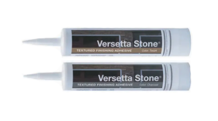 Two tubes of Versetta Stone adhesive, white with brown and gray labels, nozzles pointed left.