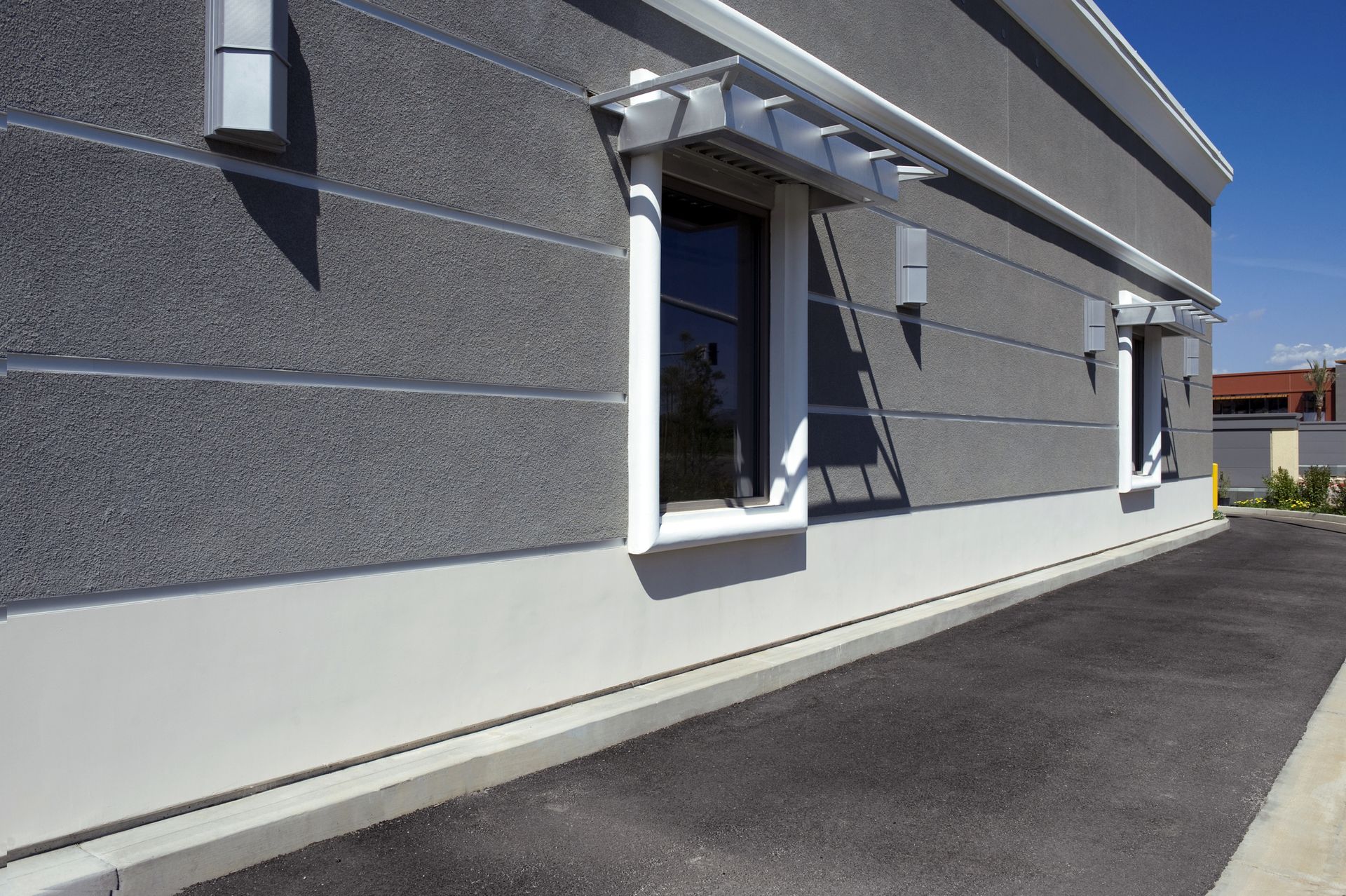 Commercial Siding Services - Quality Discount Roofing & Construction