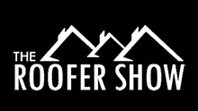 Black and white logo for "The Roofer Show." The text appears below a simplified rooftop design.