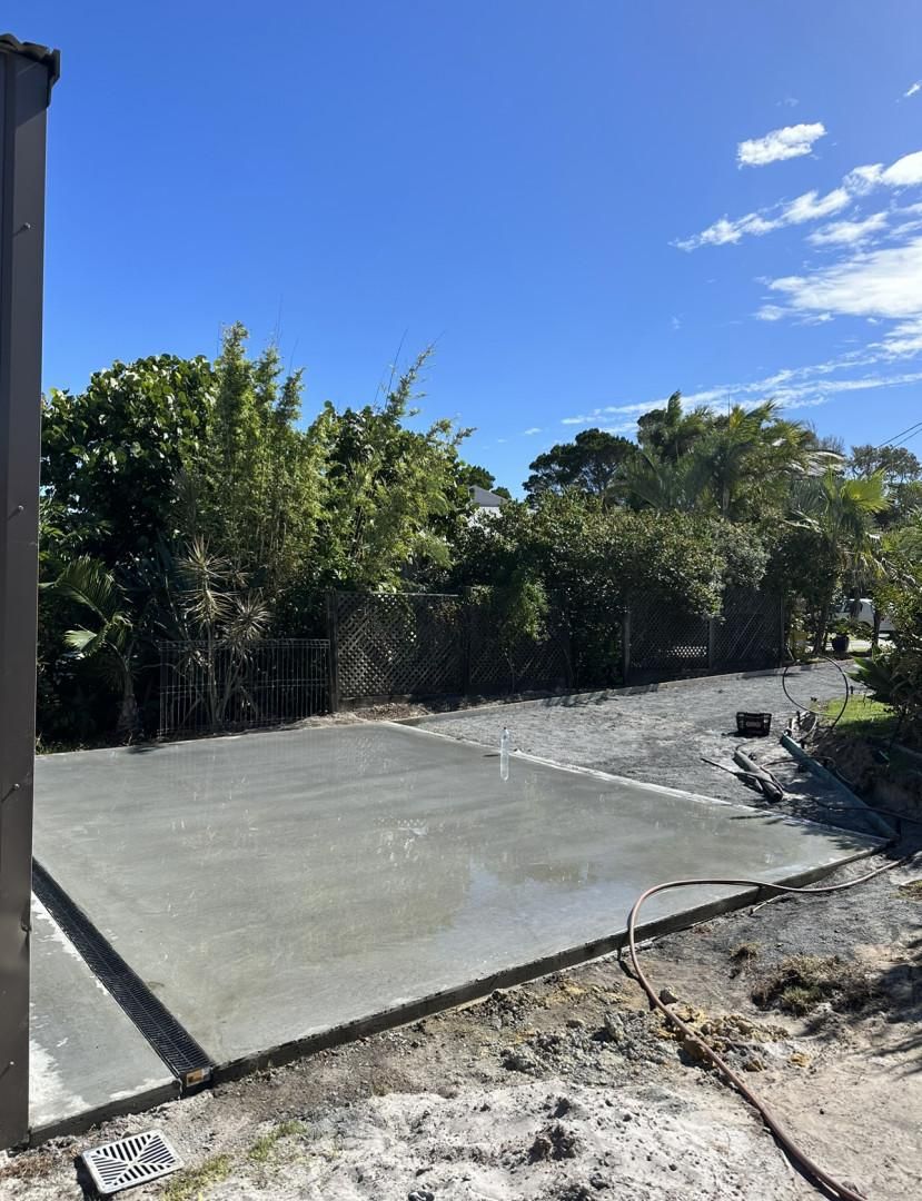 A Concrete Driveway Is Being Built In The Backyard — Hinterland Concreting Pty Ltd In Lennox Head, NSW