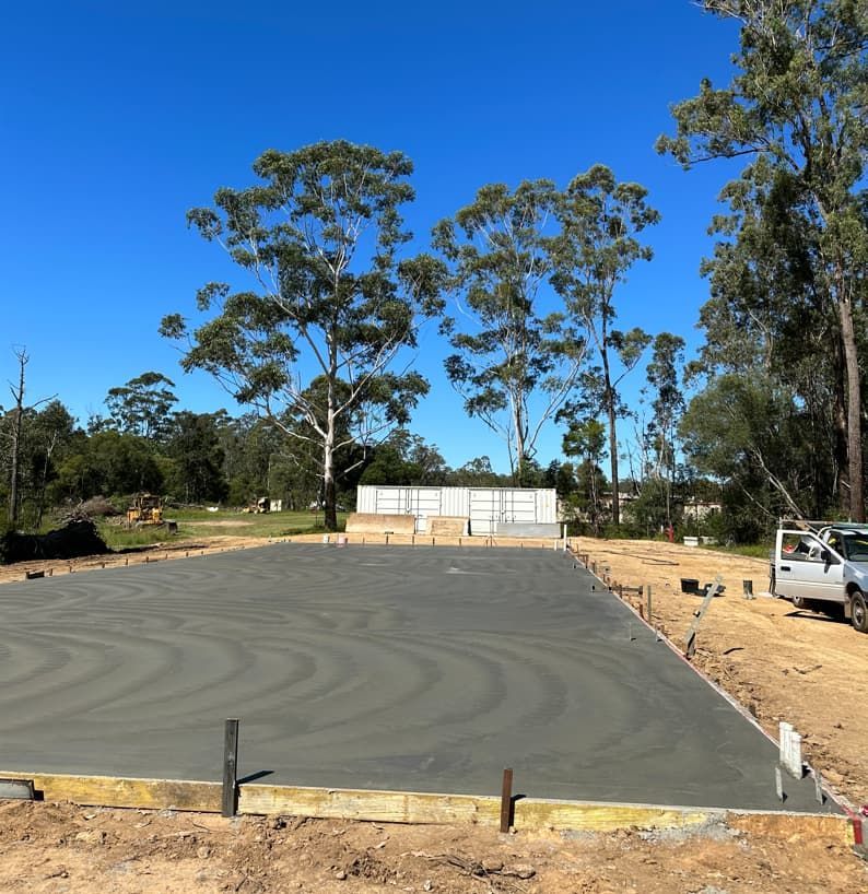 Dirt Field With Trees In The Background — Hinterland Concreting Pty Ltd In Lennox Head, NSW