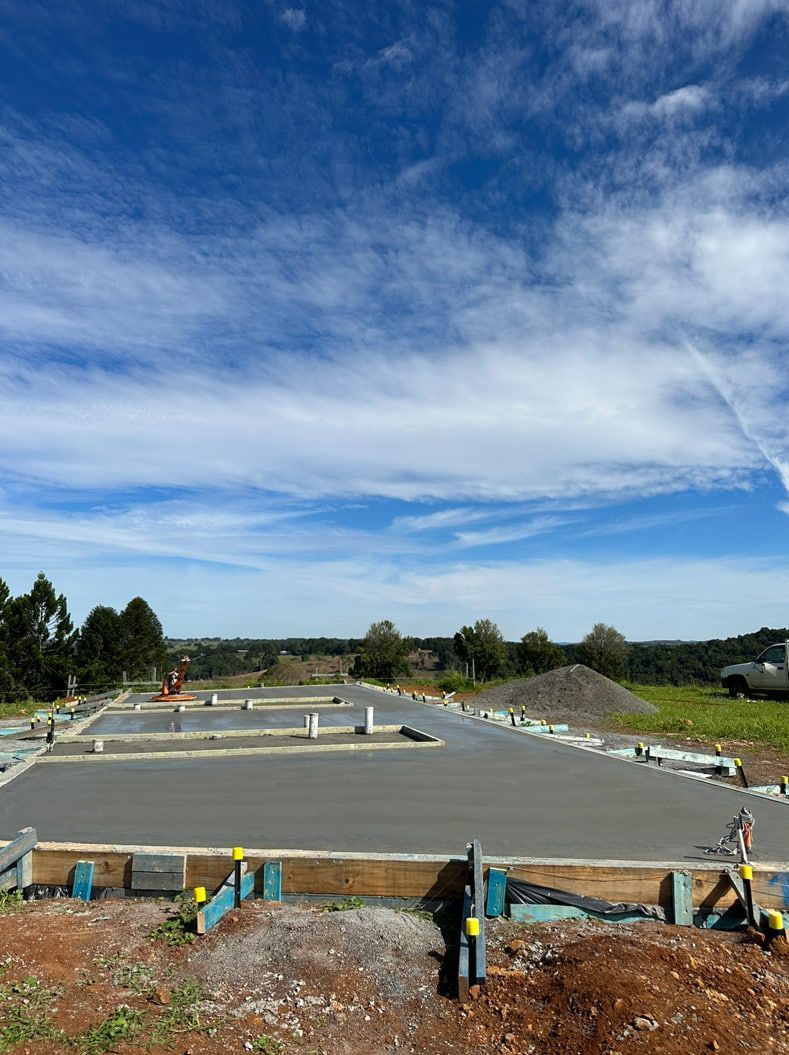 A Concrete Base For A House Under Construction With A Blue Sky — Hinterland Concreting Pty Ltd In Lennox Head, NSW