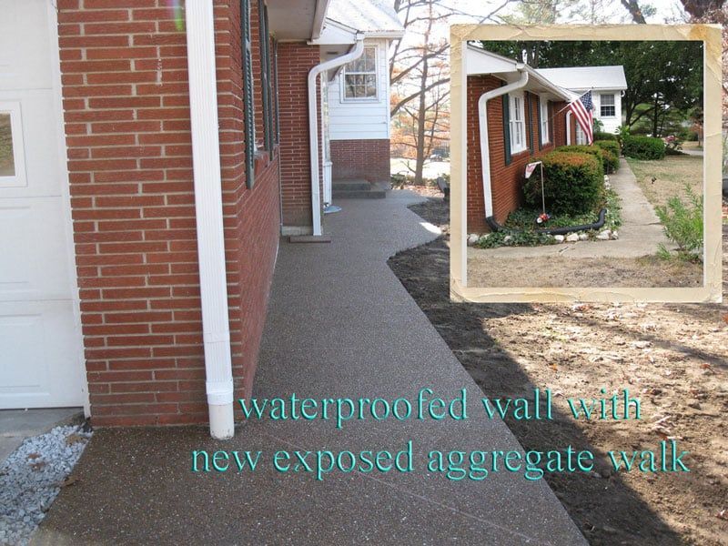 A Brick House with A Waterproofed Wall — Columbia, MO — Naugle Construction Company