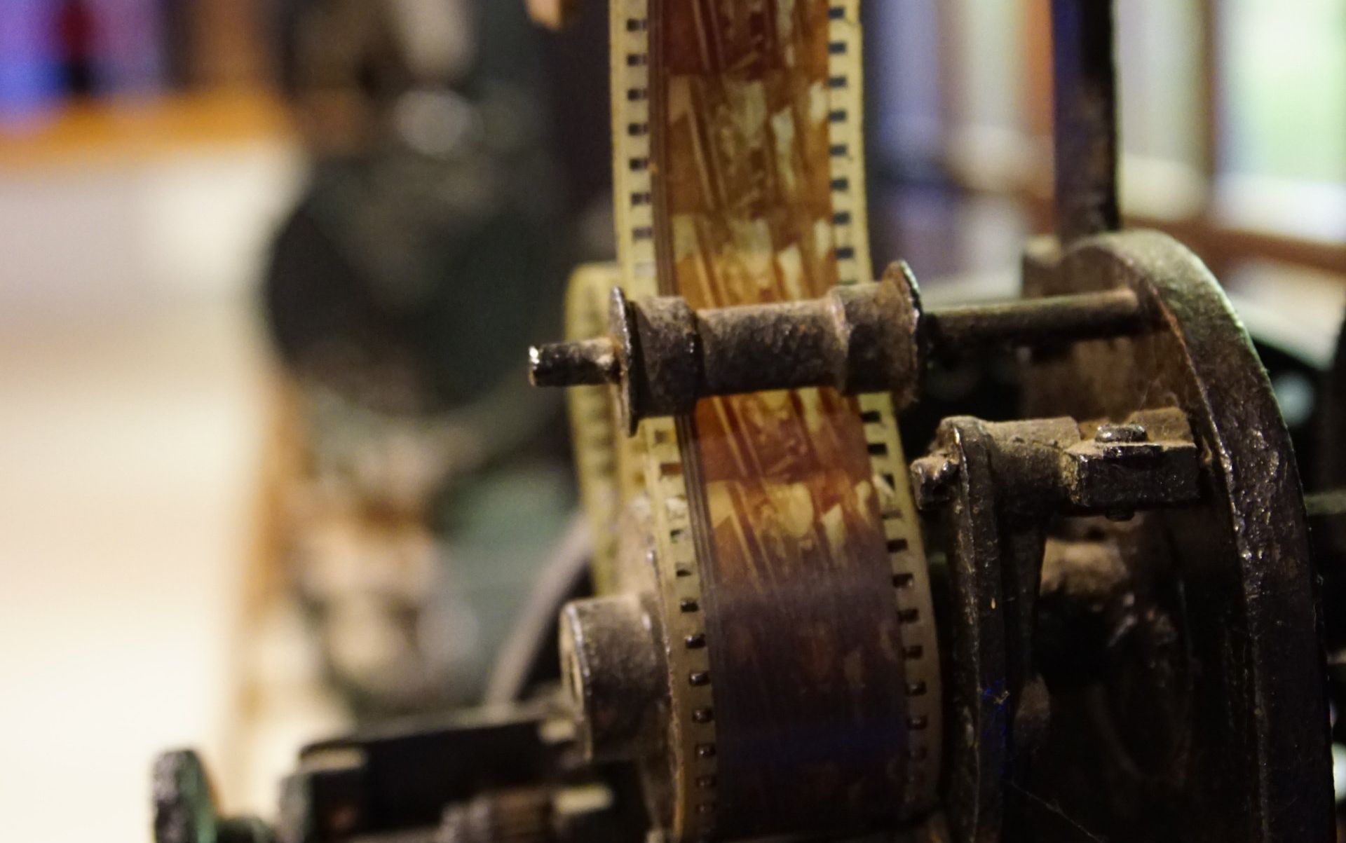 A close up of a machine with a roll of film on it.