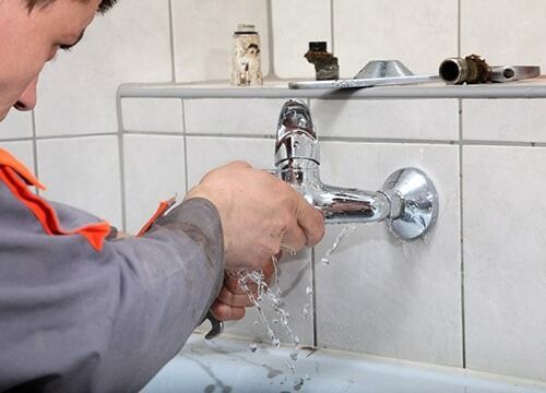 Plumber Fixing Water Tap — 24 Hour Plumber in Armidale, NSW